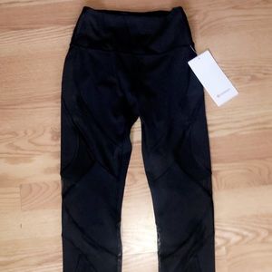 Black lulu lemon leggings with mesh
